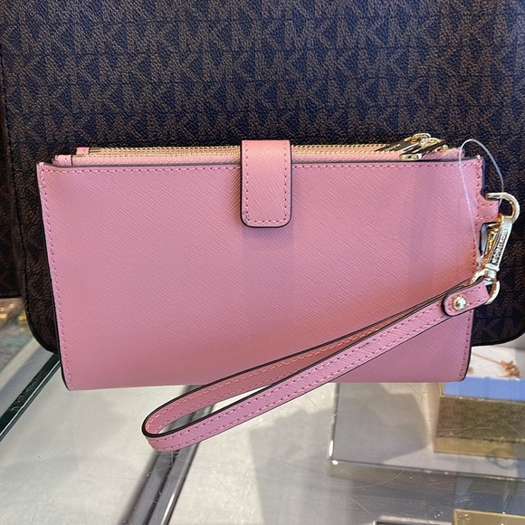 MICHAEL KORS
Jet Set Large Leather Smartphone Wristlet Wallet
Primrose 
NWT - Picture 14 of 16